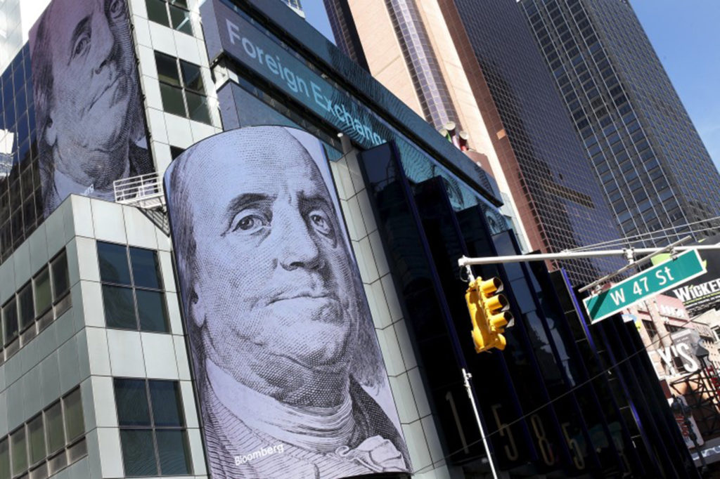 Images and market data is displayed on digital display signs on the exterior of the headquarters of Morgan Stanley at 1585 Broadway in New York's Times Square, September 16, 2015. REUTERS/Mike Segar